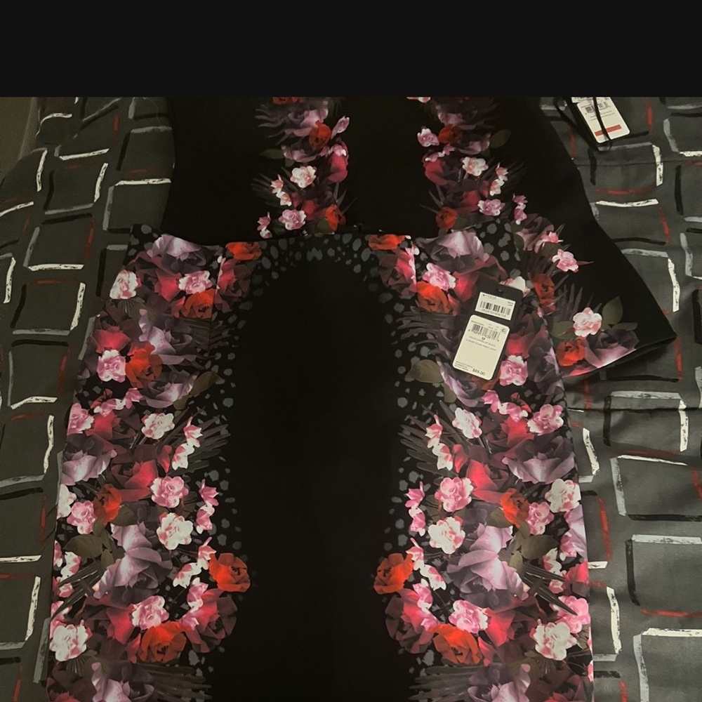 Brand new two piece multicolor/floral guess  skirt set for sale. Size L